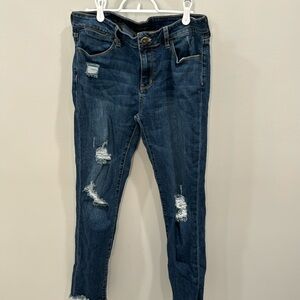 Women's skinny leg jeans with frayed bottoms and rips - size 11